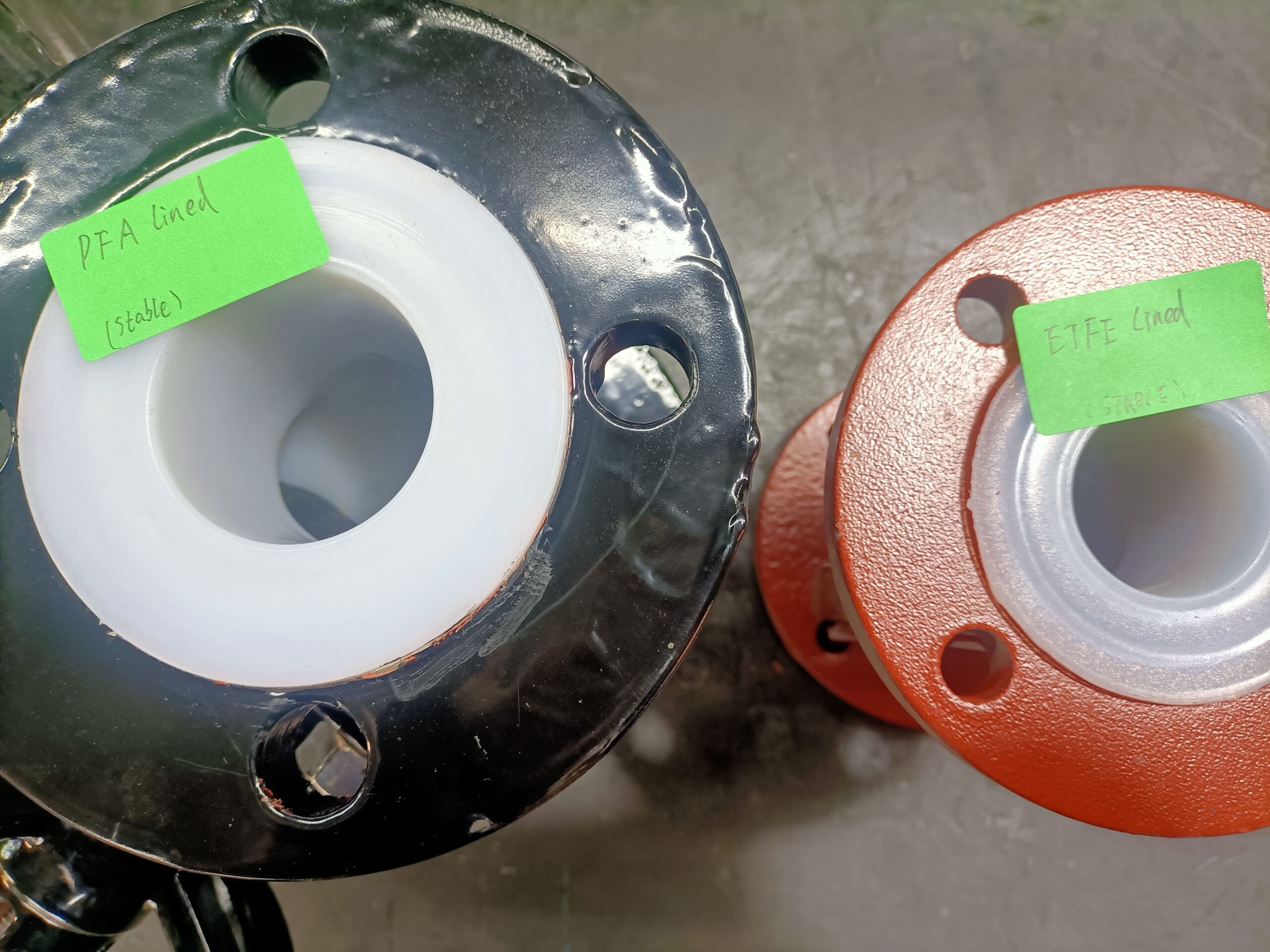 Side-by-side comparison of a rubber-lined and a plastic-lined valve.